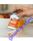 Hand holding Biotin 10 mg (10,000 mcg), Extra Strength 120 Veg Capsules bottle
