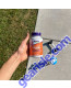 Hand holding CoQ10 600 mg 60 Softgels
