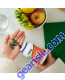 Hand holding Spirulina 500 mg 120 Veg Capsules